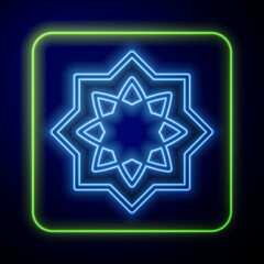 Obraz premium Glowing neon Islamic octagonal star ornament icon isolated on blue background. Vector