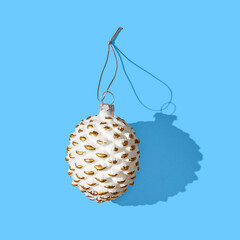Cone christmas ball on blue pastel background