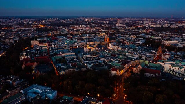 Krakow old city 4k night hyper lapse. Time lapse of the sunset in Krakow, Poland. Top view of old city center. Krakow Market Square, Poland, Time lapse. Main Square Cloth Hall Krakow time lapse. 