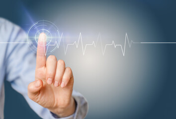 Moderm medicine. Cardiology . Woman's hand uses the icon holograms