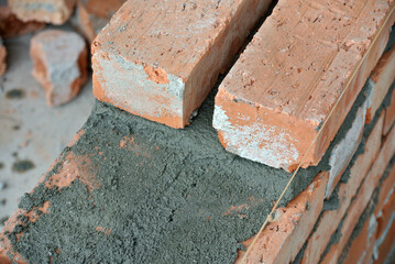 Clay brick arranged to form brick wall. 
