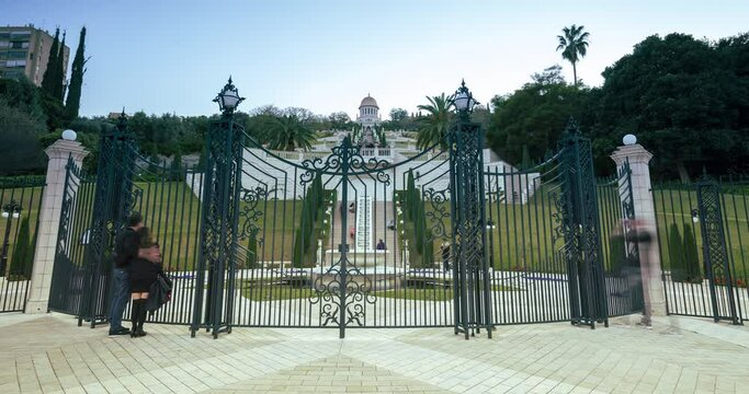 HAIFA, ISRAEL - FEBRUARY 23, 2019: Timelapse of people visiting the famous Bahai gardens and temple on the slopes of the Carmel Mountain, Haifa city, Israel