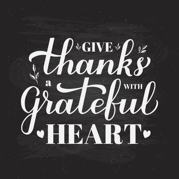 Give thanks with a grateful heart calligraphy hand lettering on chalkboard background. Thanksgiving Day inspirational quote. Vector template for greeting card, typography poster, banner, flyer, etc