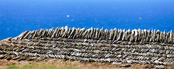 Stone wall by the sea in Cornwall England