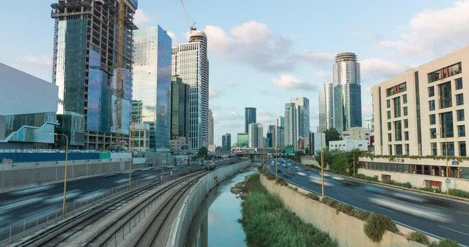 hyperlapse day to night of tel aviv skyline with urban skyscrapers, beautiful moving clouds, Israel