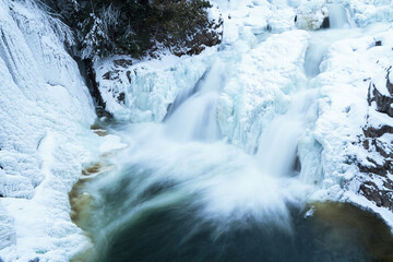 St. Agathe-de-Lotbiniere : Canadian waterfall at the begining of winter at the park on Palmer river. St. Agathe-de-Lotbiniere, Quebec. Canada