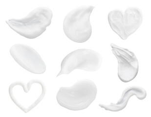Set with smears of body creams on white background