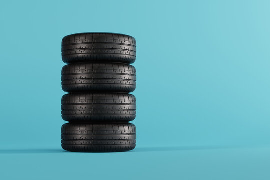 Tires on a blue pastel background. Wheel change concept, vulcanization. Seasonal tire change. 3d render, 3d illustration.