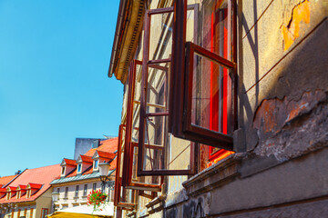 Fototapeta premium Open windows of old house , ruined wall