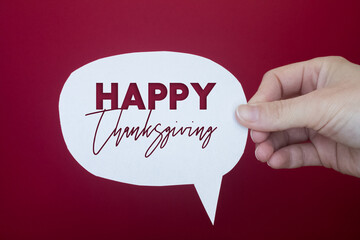 Speech bubble in front of colored background with Thanksgiving text.
