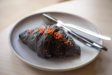 Charcoal croissant