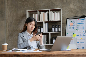 asian woman thinking hard concerned about online problem solution looking at laptop screen, worried serious asian businesswoman focused on solving difficult work computer task