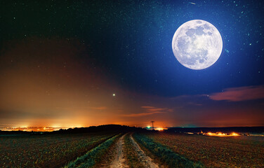 Naklejka na ściany i meble full moon against the background of the night starry sky