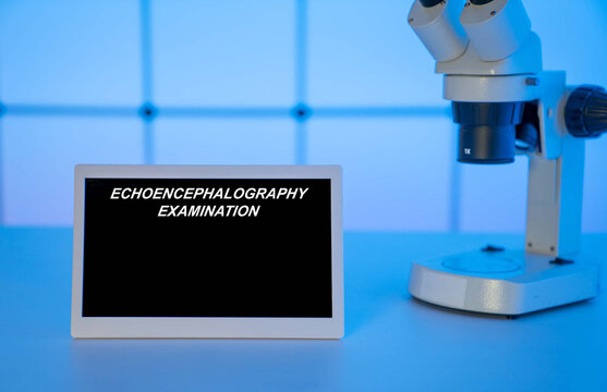 Medical tests and diagnostic procedures concept. Text on display in lab Echoencephalography Examination