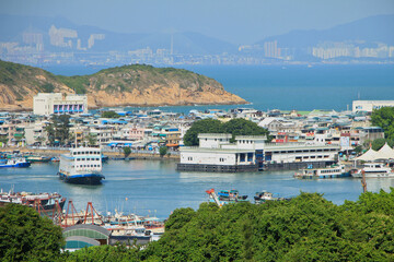 Fototapeta na wymiar Beautiful Scenery of Cheung Chau with Hong Kong Island in the Backdrop