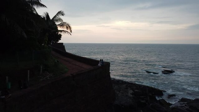 Goa, India 19th October 2022: 4k Drone shots Fort Aguada in North Goa - Seventeenth-century Portuguese fort standing on Sinquerim Beach. Popular also Watersports activities and white sand beach.  