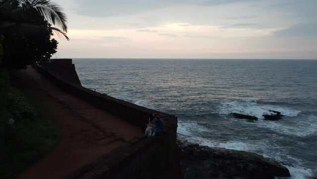 Goa, India 19th October 2022: 4k Drone shots Fort Aguada in North Goa - Seventeenth-century Portuguese fort standing on Sinquerim Beach. Popular also Watersports activities and white sand beach.  