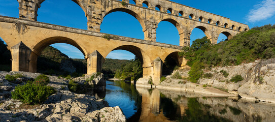 Horizontal view of famous Pont du Gard, old roman aqueduct in France