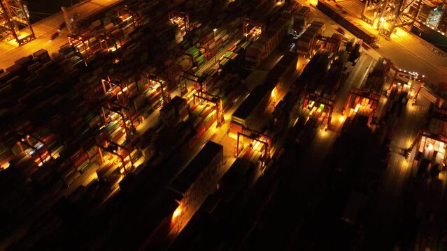 Shenzhen ,China - Circa 2022: Aerial footage of Yantian international container terminal at night in Shenzhen city, China