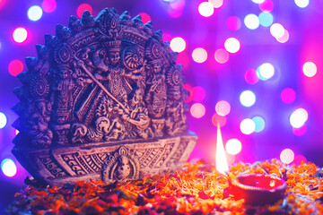 selective focus of Hindu Mythological Goddess Devi Durga clay idol. 