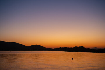 Late evening over a bay in the mediterranean sea, background or wallpaper idea for vacation advertising
