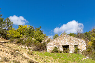 ruins of water mills on the Cofio river in Guadarrama mountains in Madrid, Spain