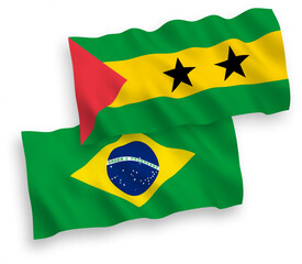 National vector fabric wave flags of Brazil and Saint Thomas and Prince isolated on white background. 1 to 2 proportion.