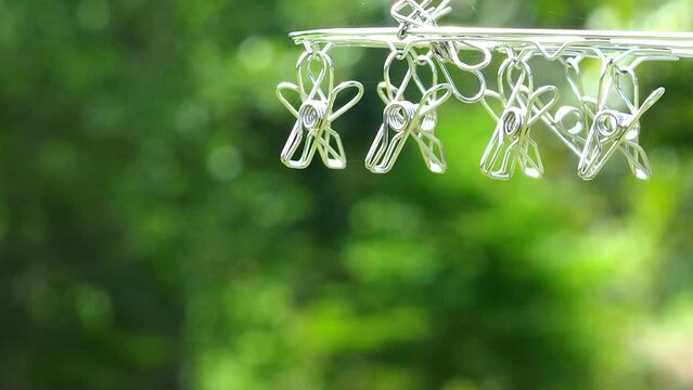 Clothes pin is hanging on clothes line, outdoor Chainagmai Thailand.
