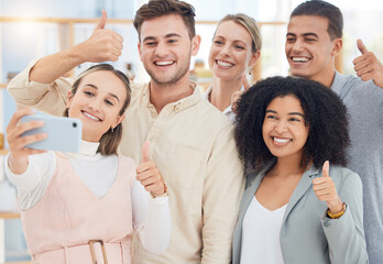 Selfie, thumbs up and business people with a phone for team building, partnership and collaboration in an office at work. Thank you, vote and hand of workers for photo on social media with a mobile