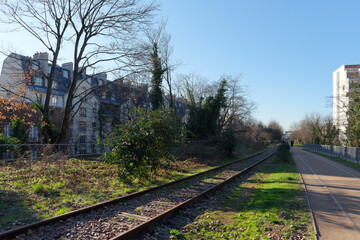 Railway track of the Petite Ceinture Paris' Abandoned Railway. 14th arrondissement of Paris city