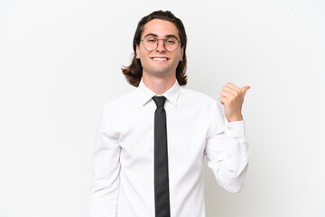 Business handsome man isolated on white background pointing to the side to present a product