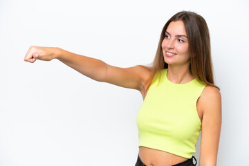 Young caucasian woman isolated on white background giving a thumbs up gesture