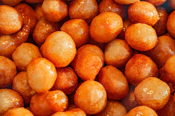 Locma, a Turkish dessert dish made of balls in sweet syrup