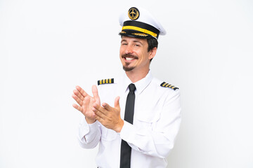 Airplane caucasian pilot isolated on white background applauding after presentation in a conference © luismolinero