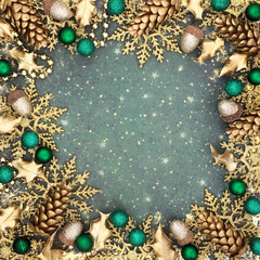 Christmas gold glitter snowflake design on grunge background border with sparkling tree decorations...