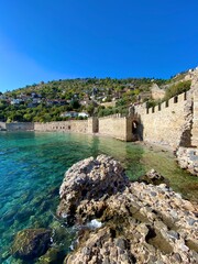 Beautiful amazing panorama. Travel landscape country Turkey in Alanya. Inspiring coast and Mediterranean Sea. Summer time. Old city.

