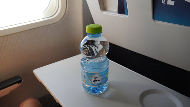 Water Bottle On Tray Airplane Interior Stock Photo 1336212170