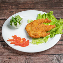fried chicken wings with salad
