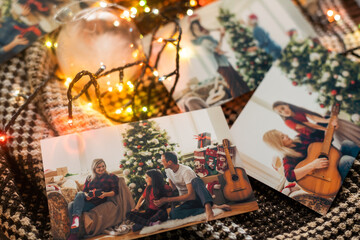 Photos of family against Christmas lights decor background