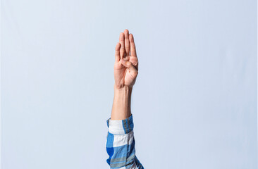 Hand gesturing the letter B in sign language on isolated background. Man hand gesturing the letter B of the alphabet isolated. Letters of the alphabet in sign language