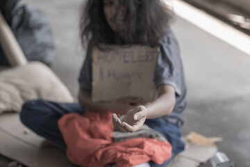 Beggar people and human poverty concept - senior person hands begging for food or help