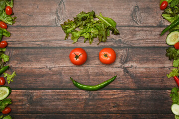 Fresh organic vegetables on wood background. Flat lay, top view with space for text. Healthy lifestyles concept