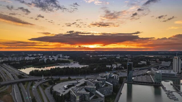 Aerial hyper-lapse of the Keilaniemi neighborhood of Espoo, Finland. Amazing sunset over the city. Summer evening.