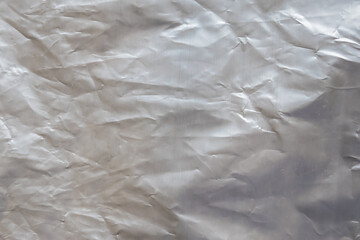 Gray plastic bag texture background close up