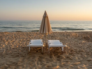 Sun beds on Falesia Beach in Portugal