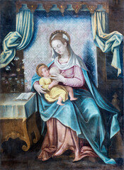 Obraz na płótnie Canvas IVREA, ITALY - JULY 15, 2022: The painting of Beastfeeding Madonna in the church Chiesa di San Salvatore by unknown artist.