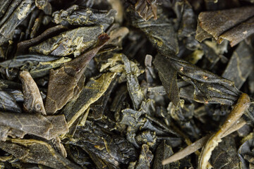 Dried Sencha green tea leaves.