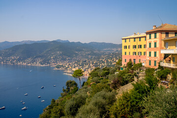 Fototapeta na wymiar Panorama of the Ligurian coastline near Camogli with houses in bright colors.