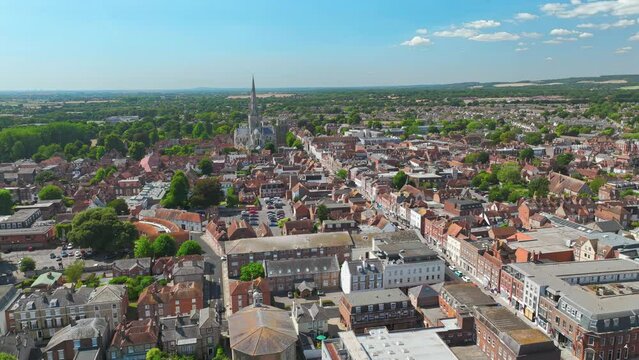 Chichester, UK: Aerial view of city in England, Cathedral Church of the Holy Trinity on horizon, summer day with clear blue sky - landscape panorama of United Kingdom from above