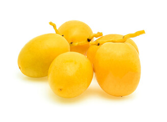Yellow raw date palm isolated on white background.